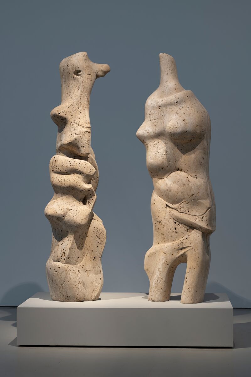 Henry Moore, Two Standing Figures, Travertine marble, Photo by Jonty Wilde, Reproduced by permission of The Henry Moore Foundation.jpg