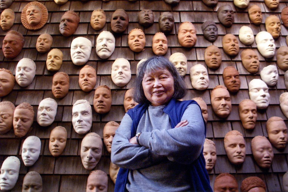 Ruth Asawa with life masks on the exterior wall of her house.jpg